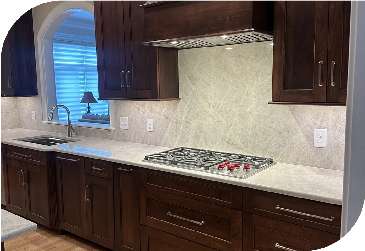 Modern kitchen with dark wood cabinets.
