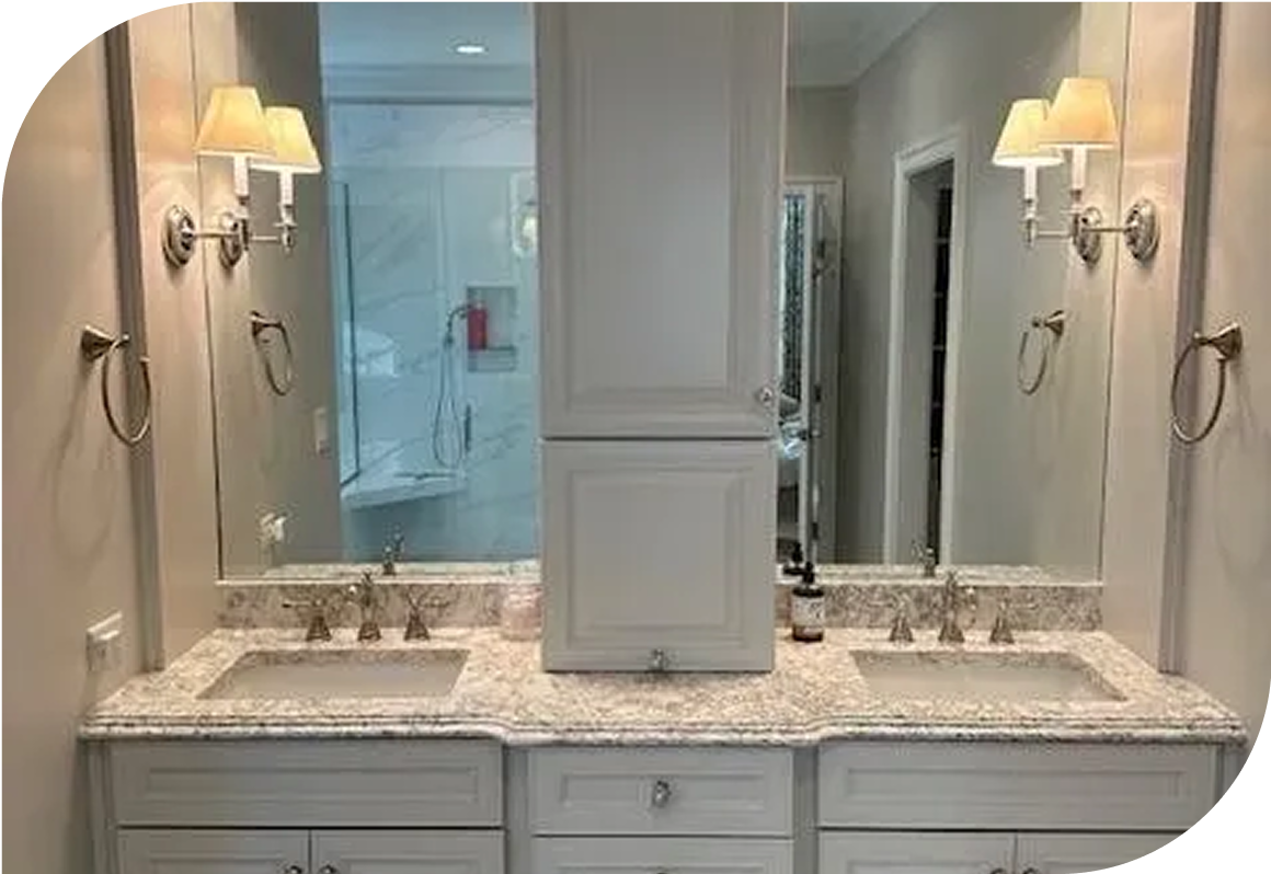 Elegant bathroom with double sinks and mirrors.