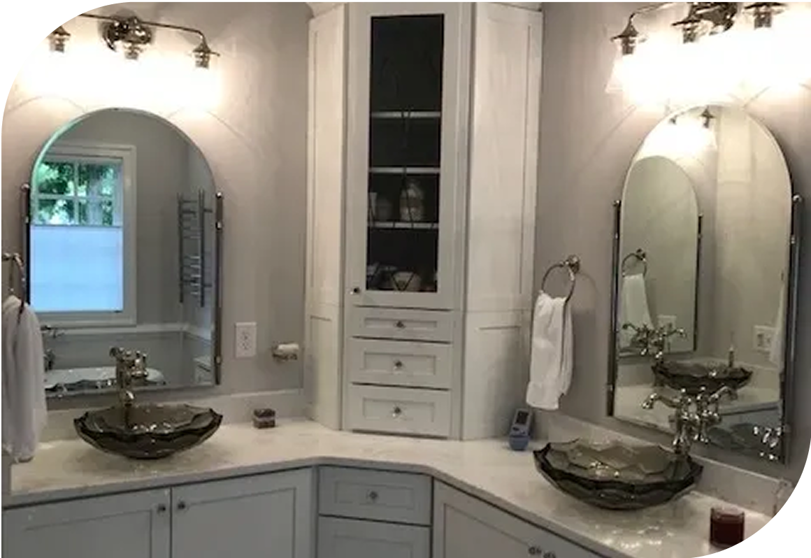 Elegant bathroom with dual sinks and mirrors.